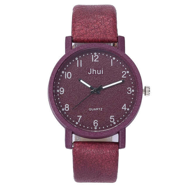 Ladies quartz wrist watch featuring round burgundy dial and leather strap, perfect for casual fashion styles.