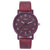 Ladies quartz wrist watch featuring round burgundy dial and leather strap, perfect for casual fashion styles.