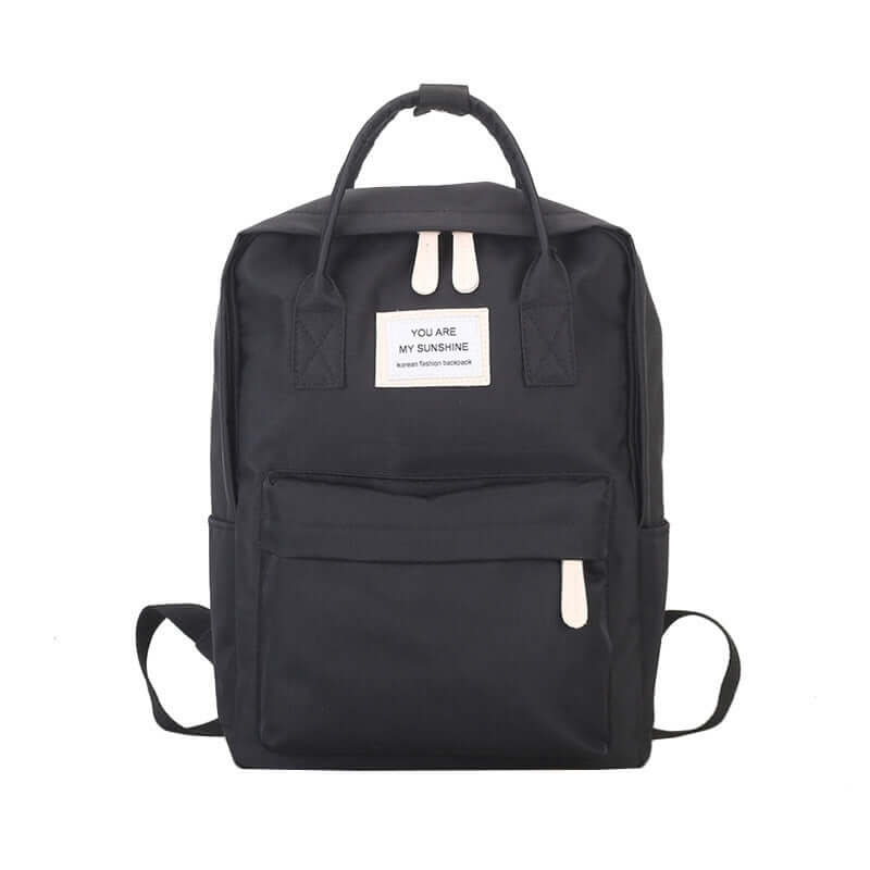 Stylish black backpack with "You Are My Sunshine" label, featuring durable canvas material and multiple compartments.