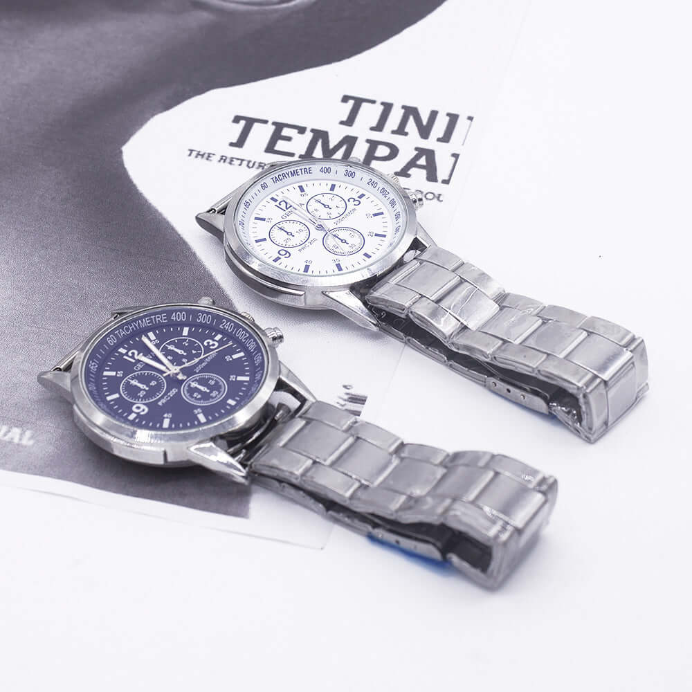 Stylish men's quartz wrist watches with round dials and stainless steel bands, featuring a modern design.