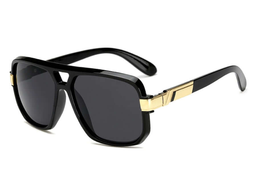 Retro sunglasses with black plastic frame and gold accents, perfect for a vintage style look.