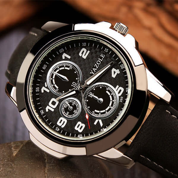 Men's quartz watch with black dial and stainless steel case, showcasing chronograph features and a durable PU strap.