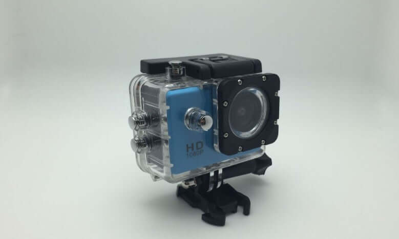 Waterproof sports camera recorder with HD capability and protective housing for outdoor adventures.